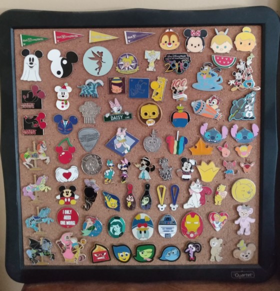 A collection of disney pins for trading which were purchased in